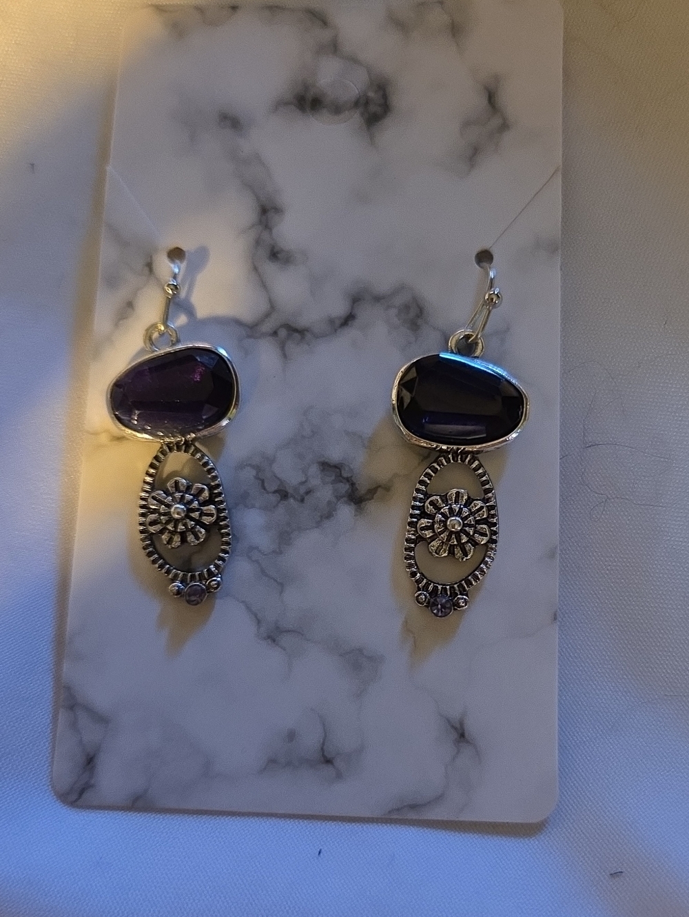 Silver Floral Drop Earrings with Purple Stone